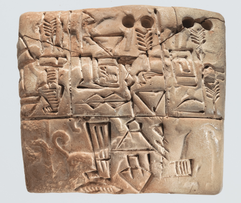 Proto-cuneiform clay tablet with seal impressions from ancient Mesopotamia